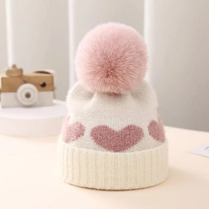 Gebreide Baby Muts Met Hartjes En Pompon - KidsKorner